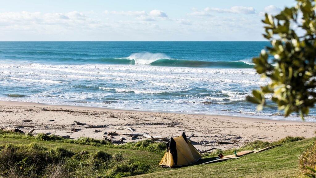 surfers camping out at a beach break (2)